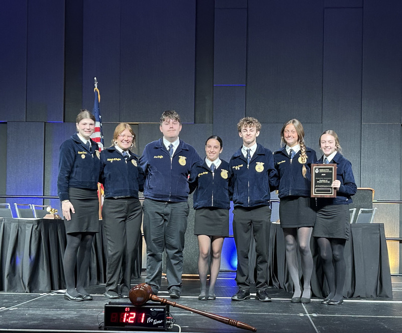 WHHS group team photo. The student on the end on the right is holding the their silver award. The photo is the National conduct of Chapter Meeting team.