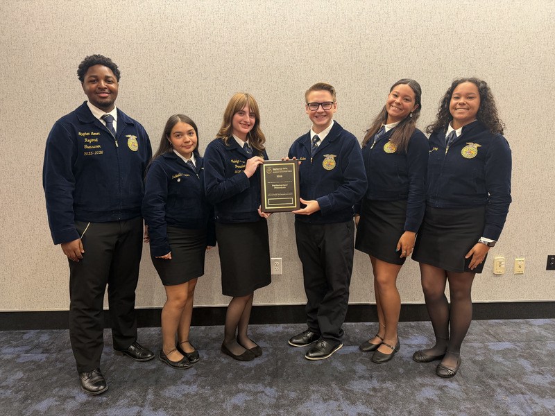 WHHS National Senior Parliamentary Procedure Team Photo. The two students in the center are holding their bronze award.