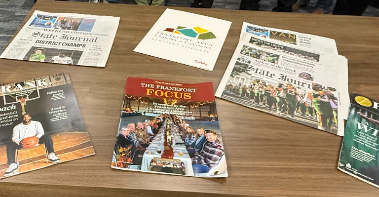 Frankfort State Journal prints on a table