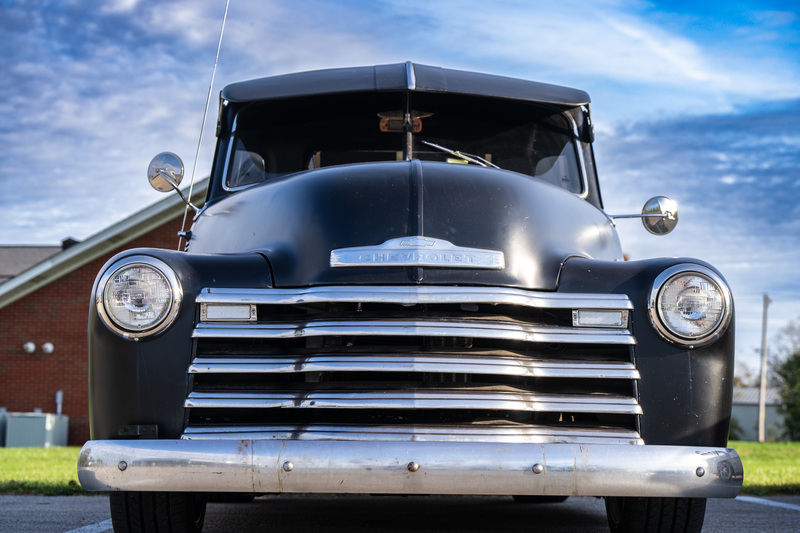 black truck parked in parking lot