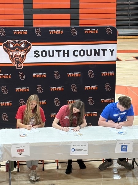 Pictures of students at senior signing day.