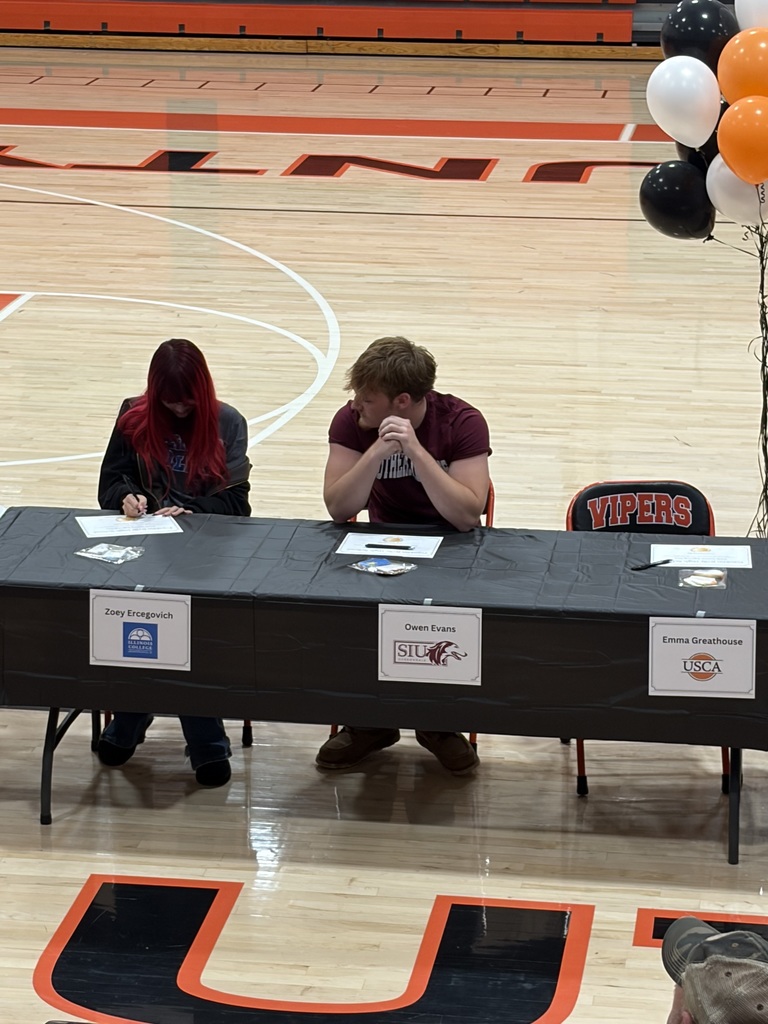 Pictures of students at senior signing day.