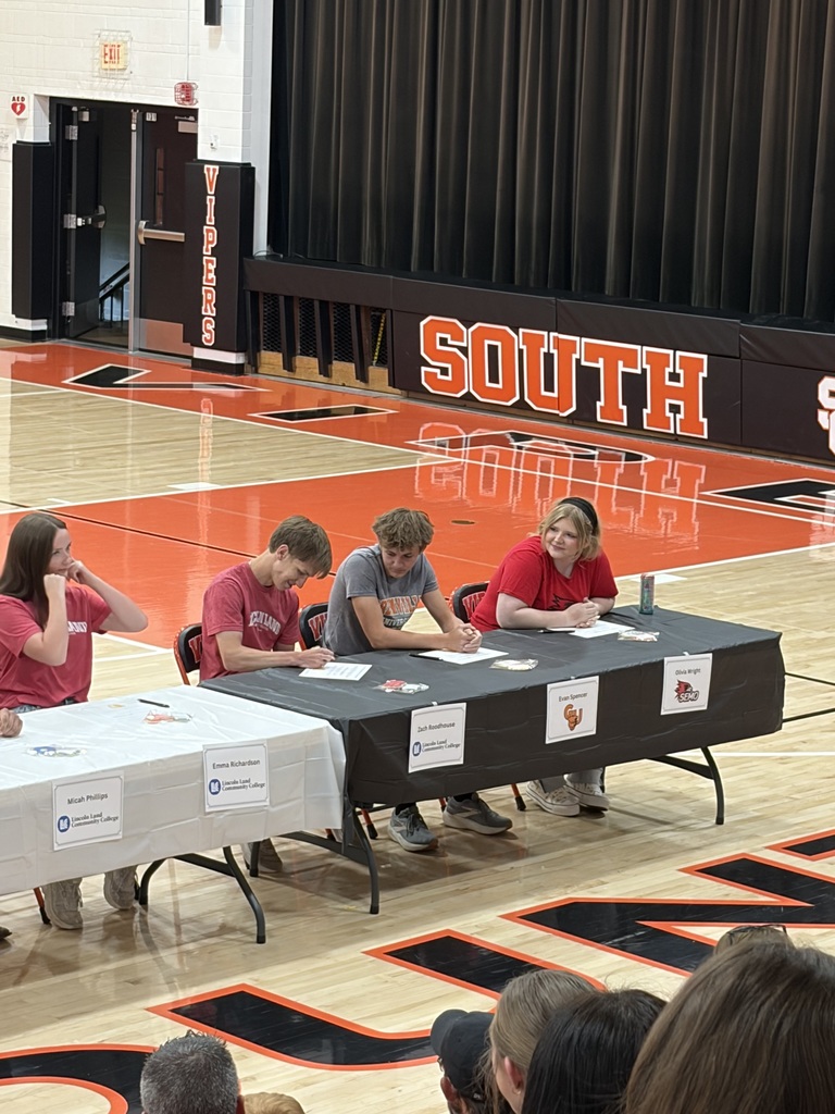Pictures of students at senior signing day.