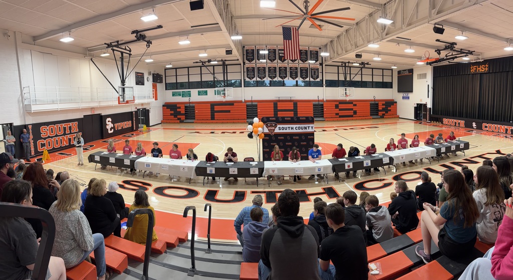 Pictures of students at senior signing day.
