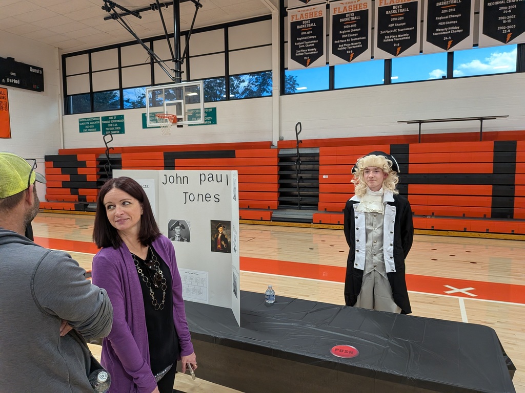 Wax museum exhibits provided by the 8th grade class. Multiple pictures taken at the event.