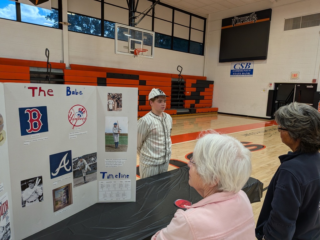 Wax museum exhibits provided by the 8th grade class. Multiple pictures taken at the event.