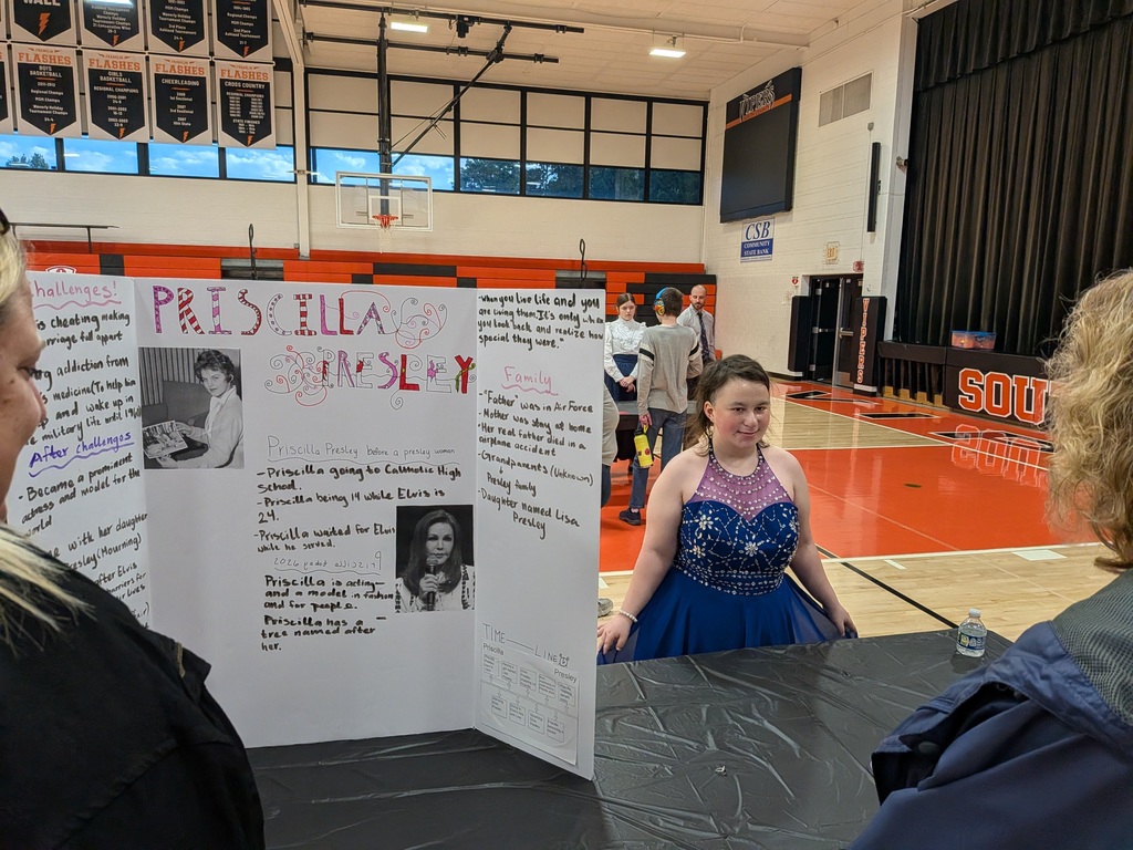 Wax museum exhibits provided by the 8th grade class. Multiple pictures taken at the event.