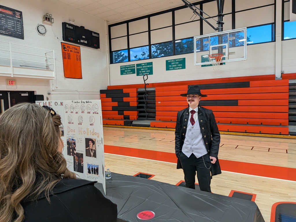 Wax museum exhibits provided by the 8th grade class. Multiple pictures taken at the event.