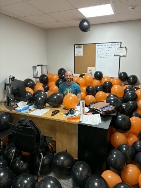 seniors decorated our principals office with balloons.