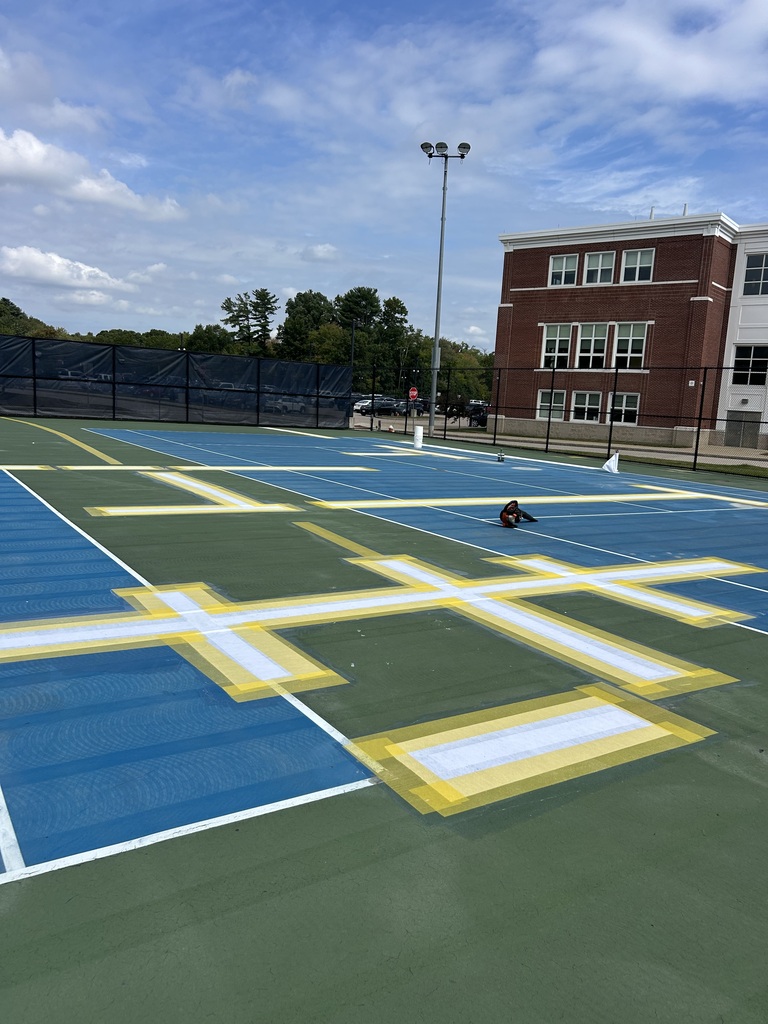 Tennis Courts against a blue sky