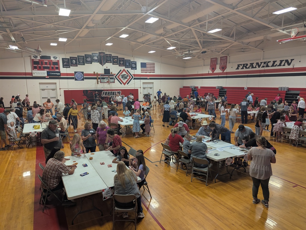 The gym was full of grandparents and students playing games.
