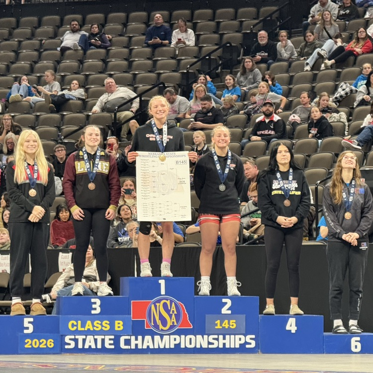 Audrey receiving medal.