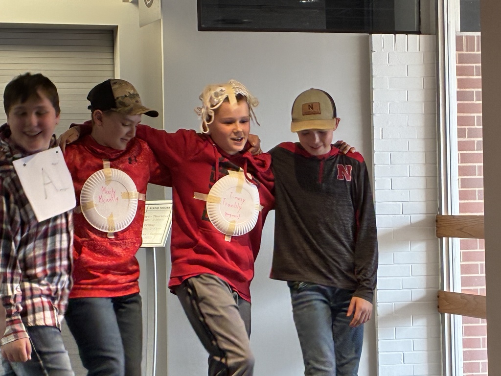 future problem students in a line performing their skit.