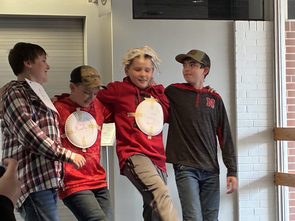 future problem students in a line performing their skit.
