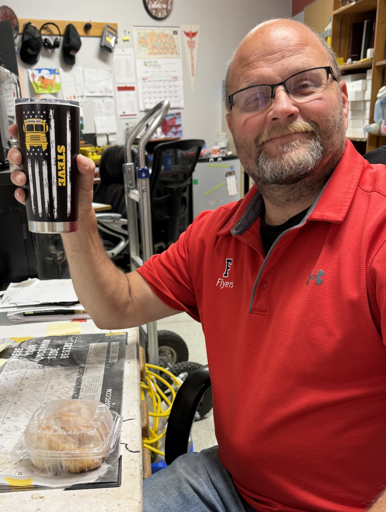 Steve Decker, Franklin Public School bus driver in his custodial office.