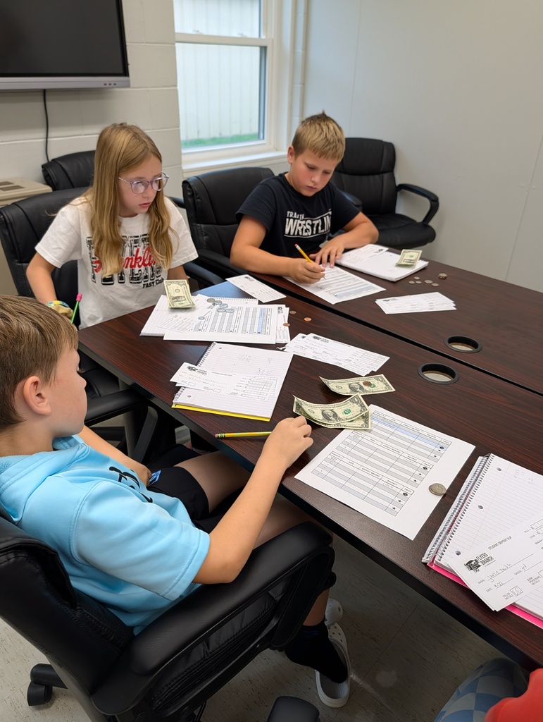 The 5th grade students are trainer for their new teller position. 