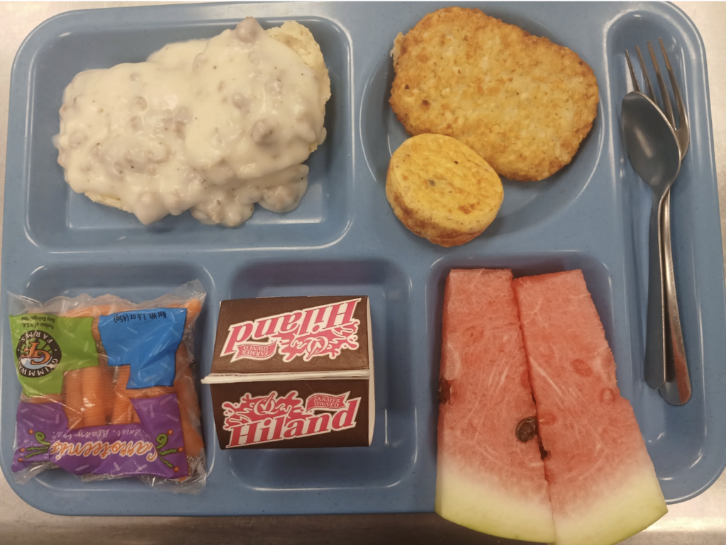 Tray of food promoting fresh donated sausage for  gravy