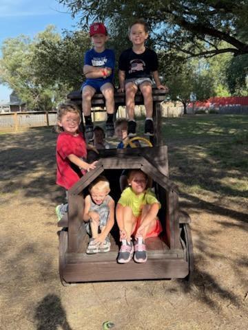 Students playing on the playground. 