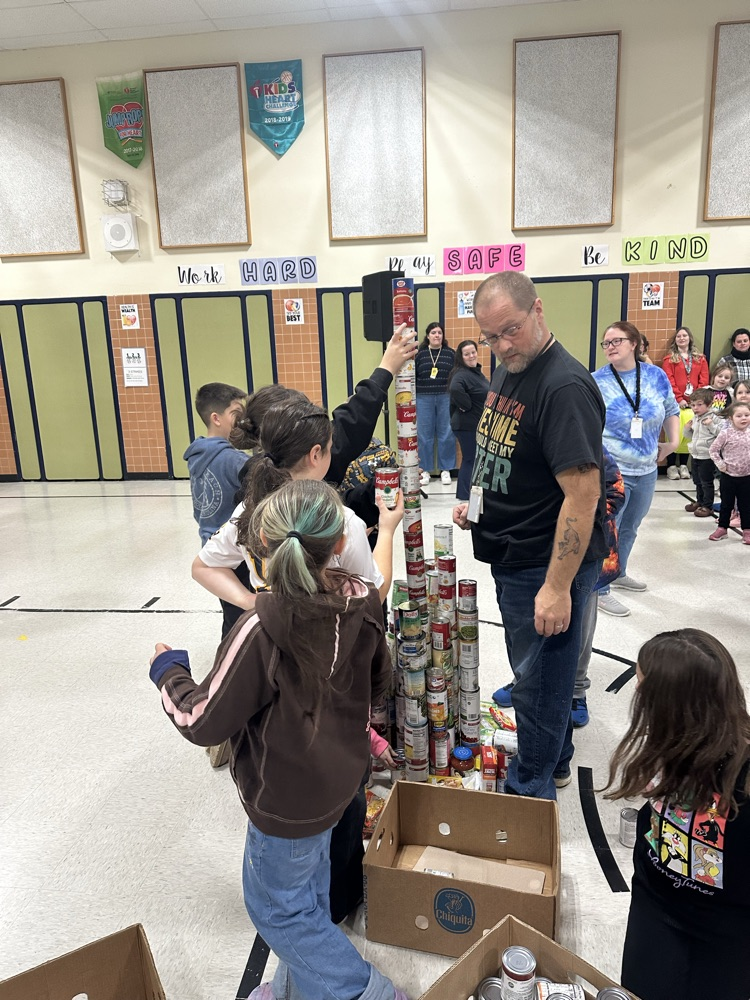 PSS participates in the Mix 94.1 Cash and Cans food drive .