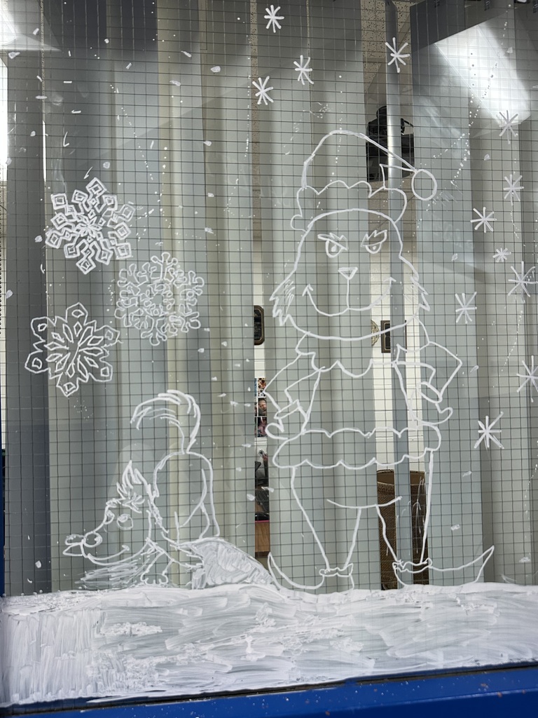 Winter landscape drawn on the windows by students
