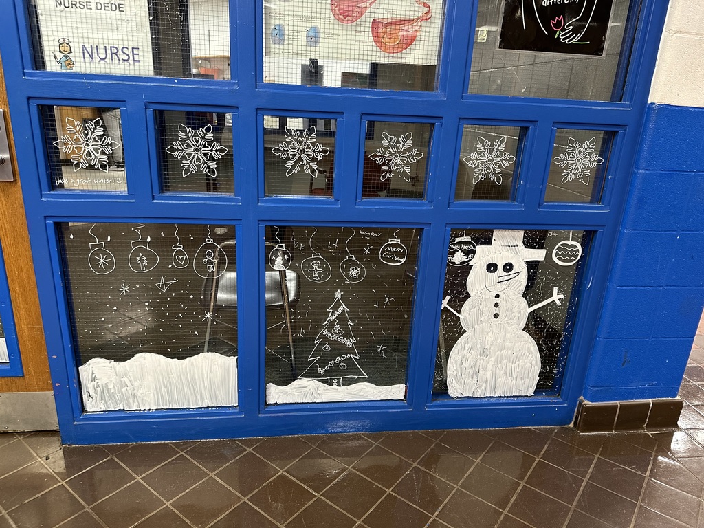 Winter landscape drawn on the windows by students