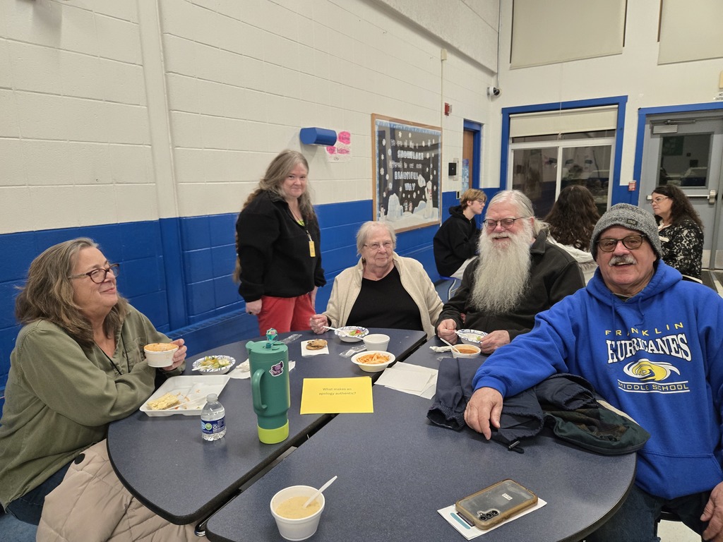 community members sitting around the table