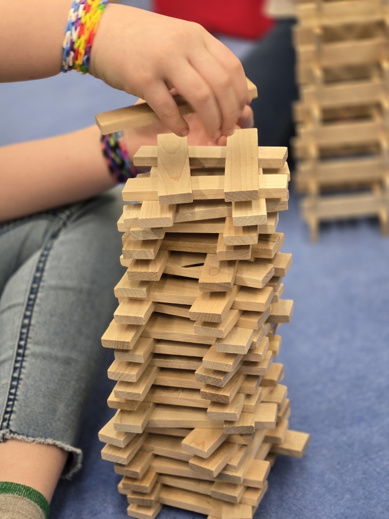 Students building with Keva Blocks