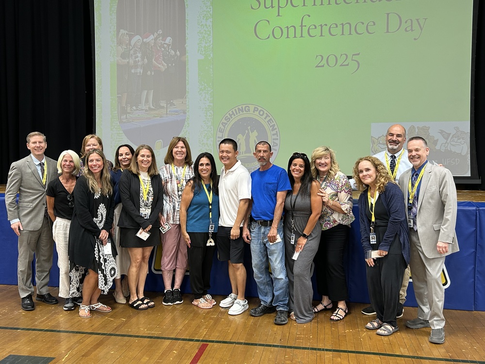 Staff Members in Auditorium