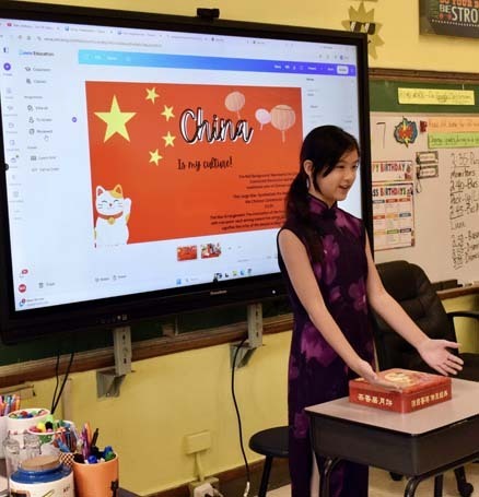 Student giving presentation on China.