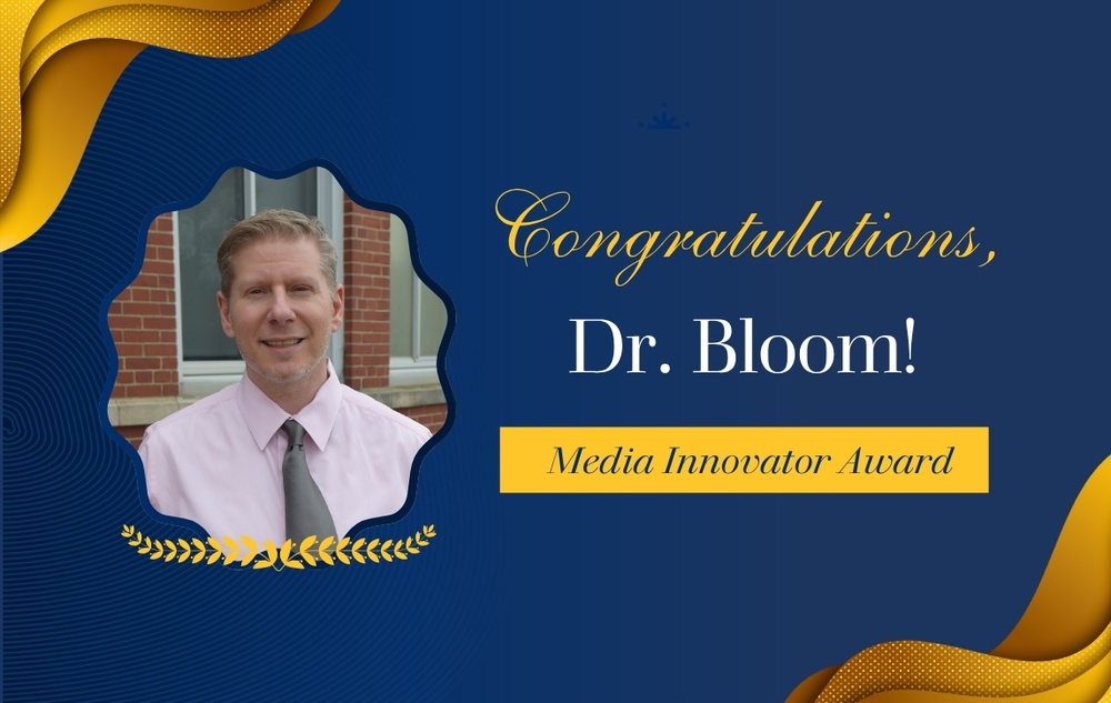 Alt text: "Award announcement with blue and gold theme. Image of a person in a pink shirt and tie. Text: 'Congratulations, Dr. Bloom! Media Innovator Award.'"