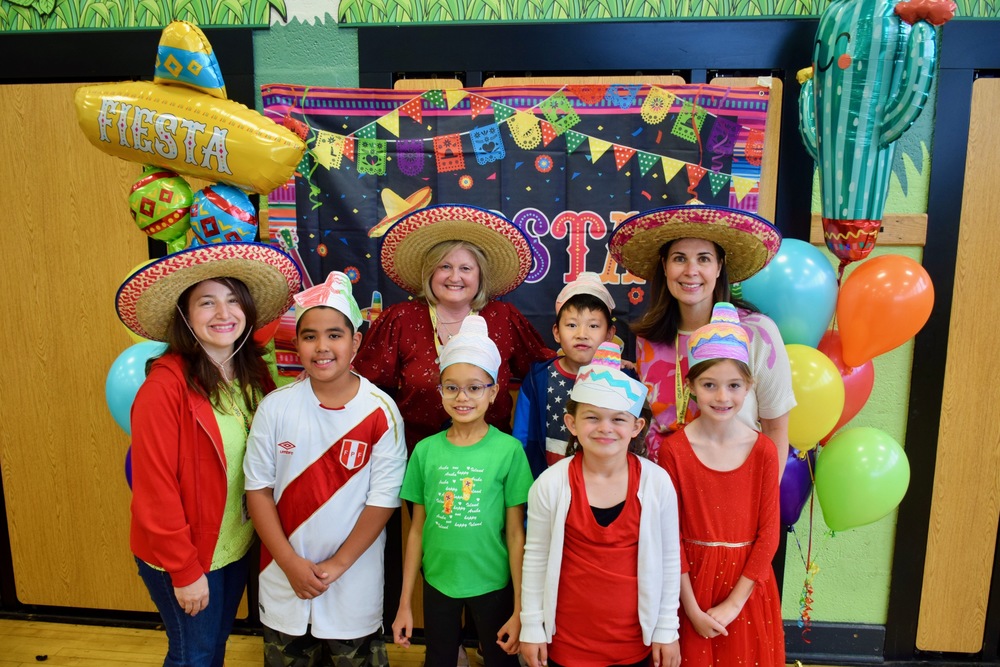 Students and Teachers With Hats On