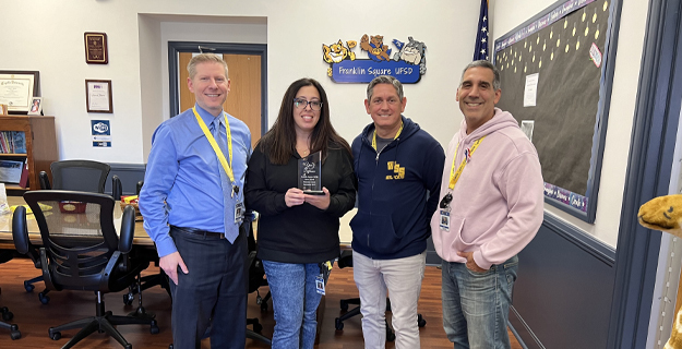Washington Street School Monitor Roseanne Alessi received a Hero Award in honor of her recent act of kindness and bravery, saving a student by performing the Heimlich. 