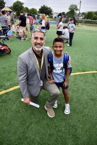 Principal with students.