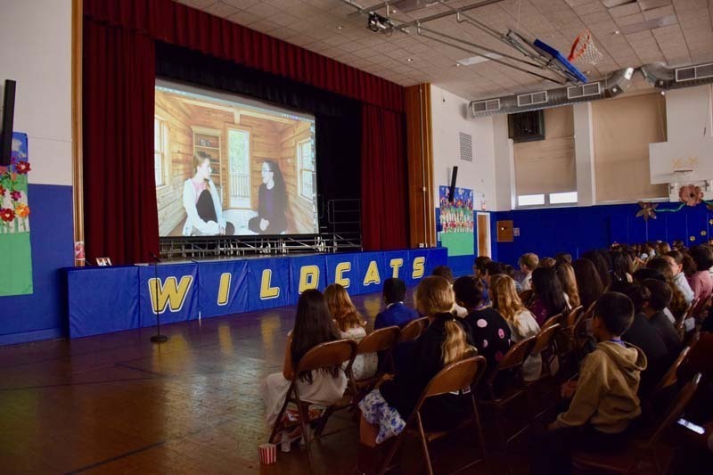             Washington Street School’s gymnasium was transformed into a Hollywood-style movie premiere, complete with snacks and a red-carpet atmosphere, during the inaugural Franklin Square Film Screening on May 21.