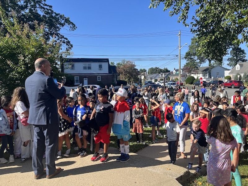 students gathering outside the school