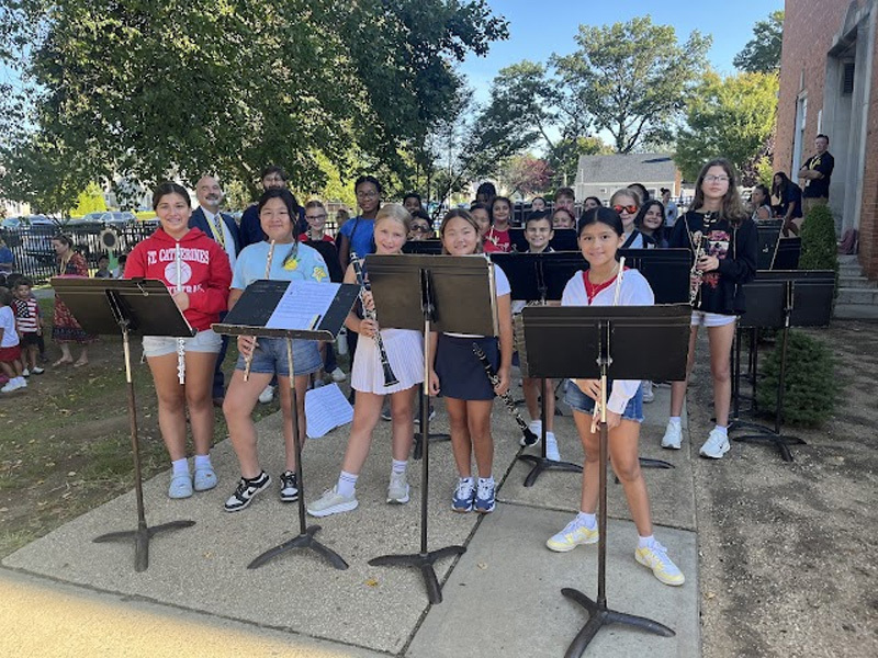 students performing instruments