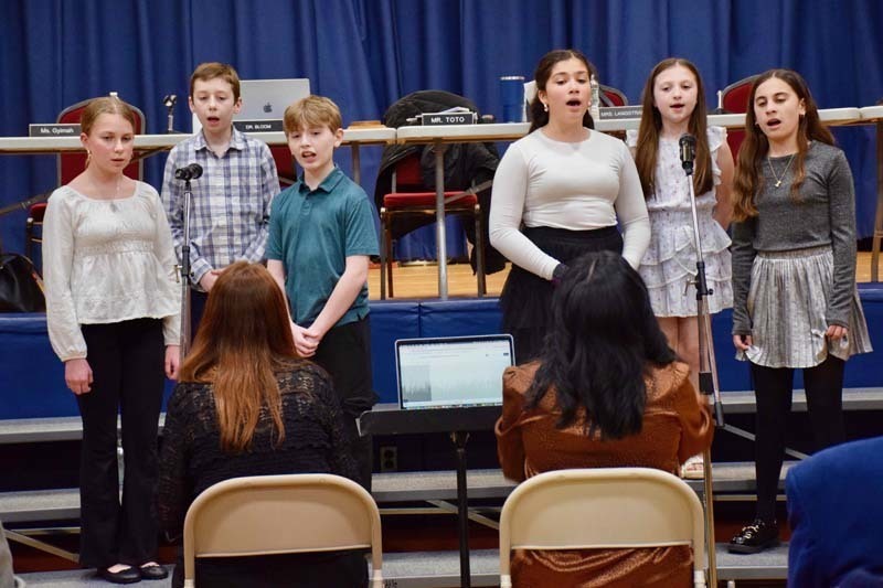 The district celebrated Music in Our Schools Month with special student performances and recognitions during the board of education meeting on March 11.