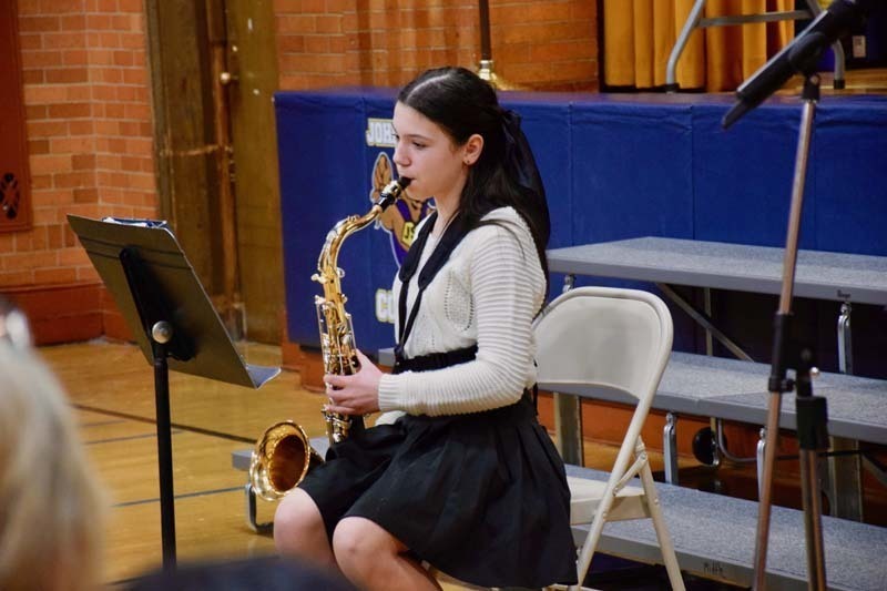 The district celebrated Music in Our Schools Month with special student performances and recognitions during the board of education meeting on March 11.
