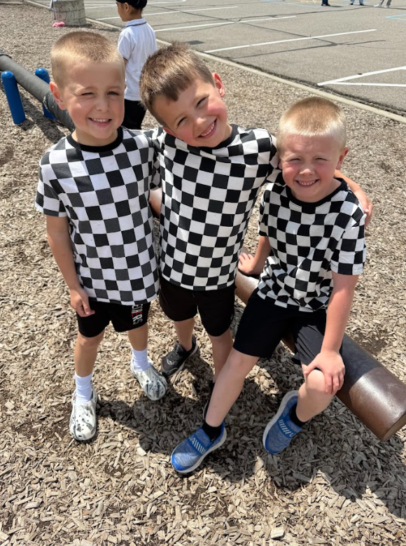 3 boys in matching checkered shirts