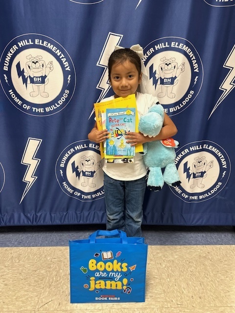 student with book raffle winnings