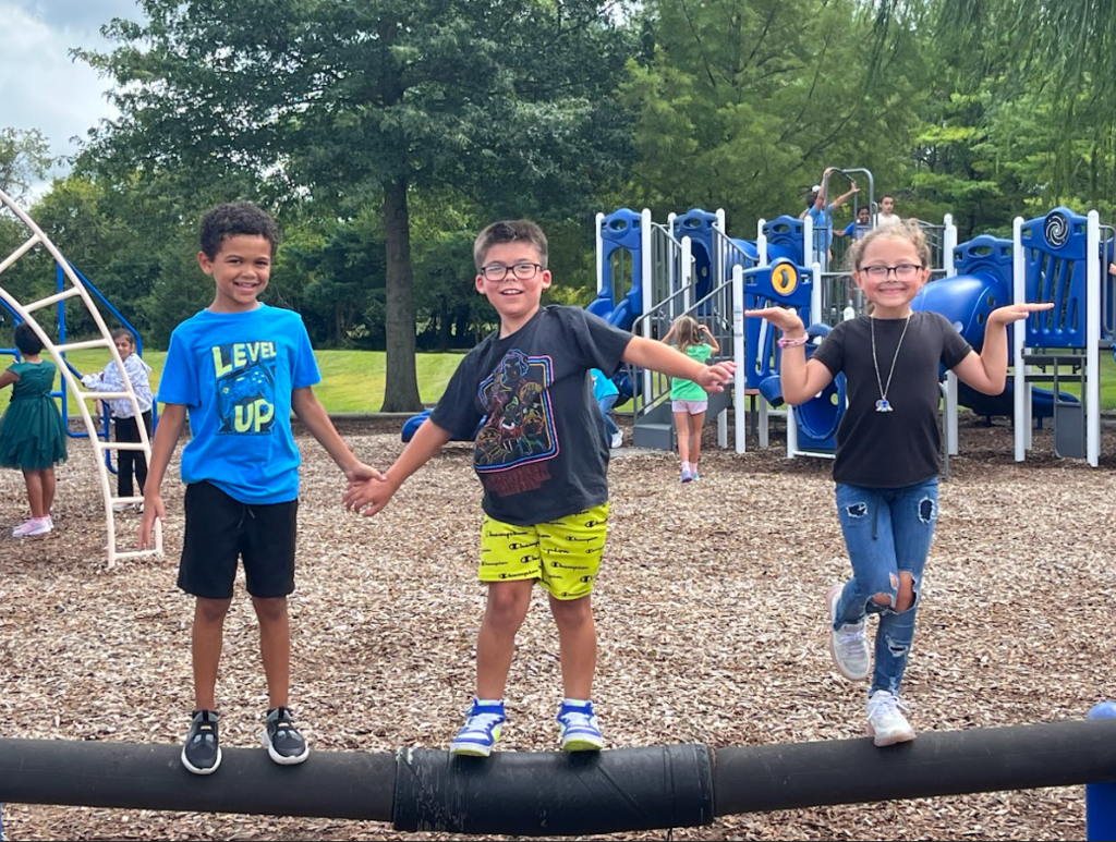 3 students balancing