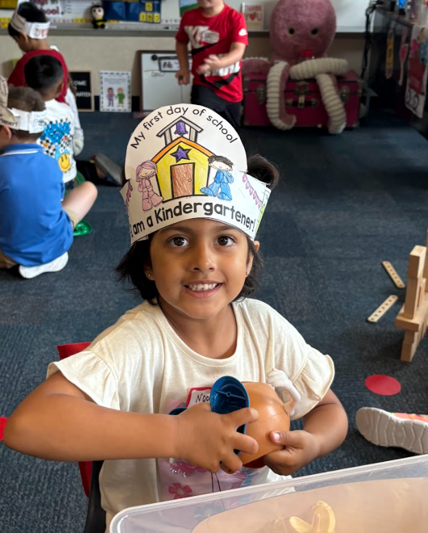 Student smiling with headband