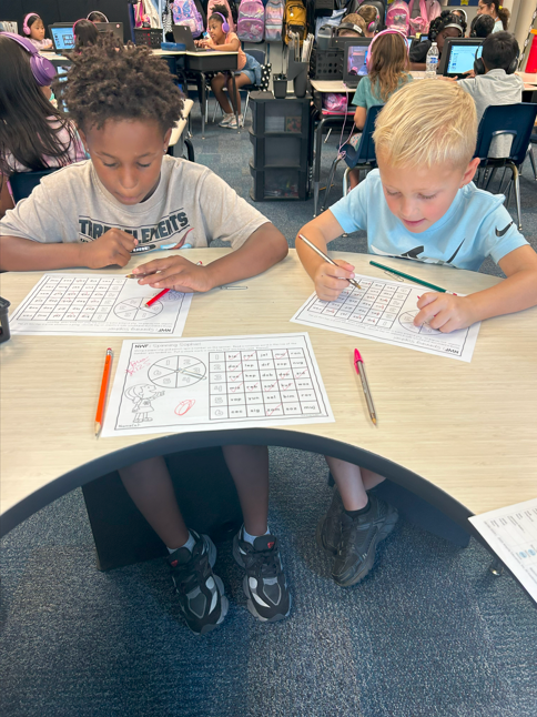 two students working on math