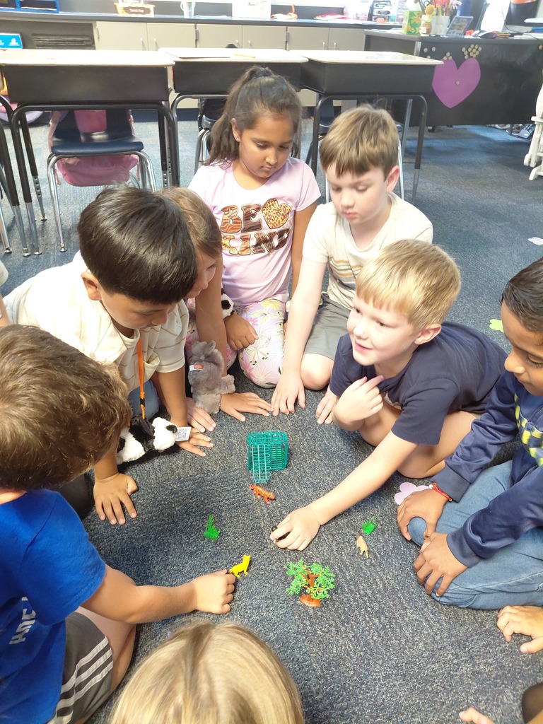 Students playing on floor