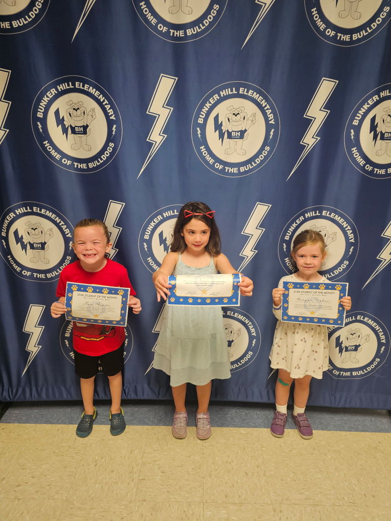Kindergarten students with their Star student certificates