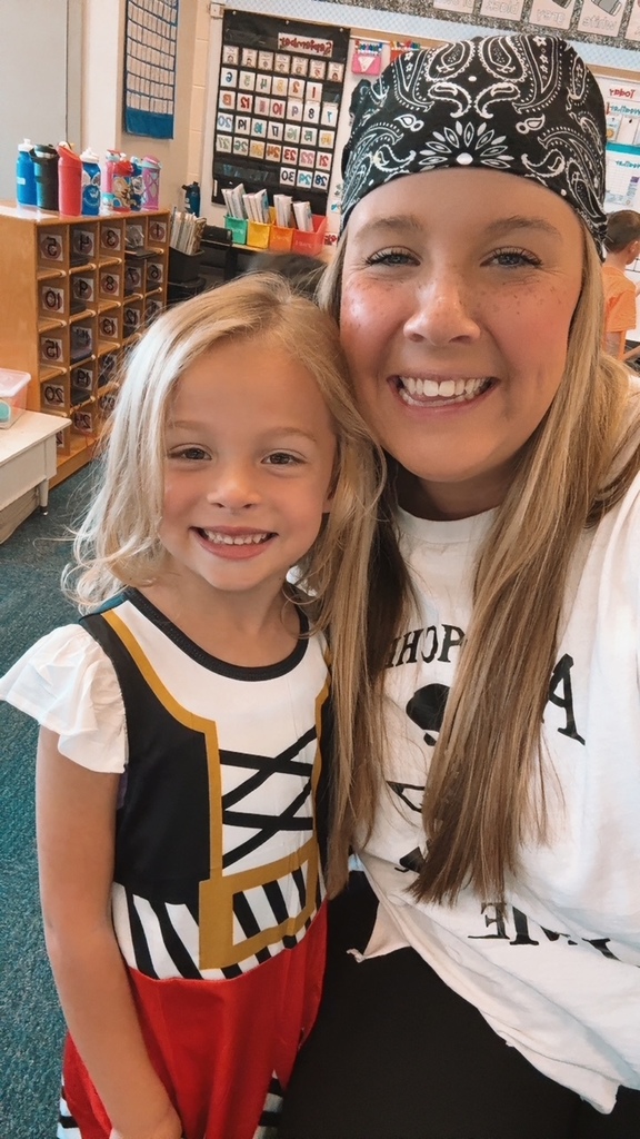 Teacher and student dressed up like pirates