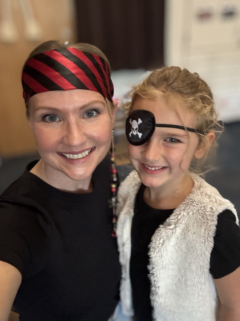 Teacher and student dressed up like pirates