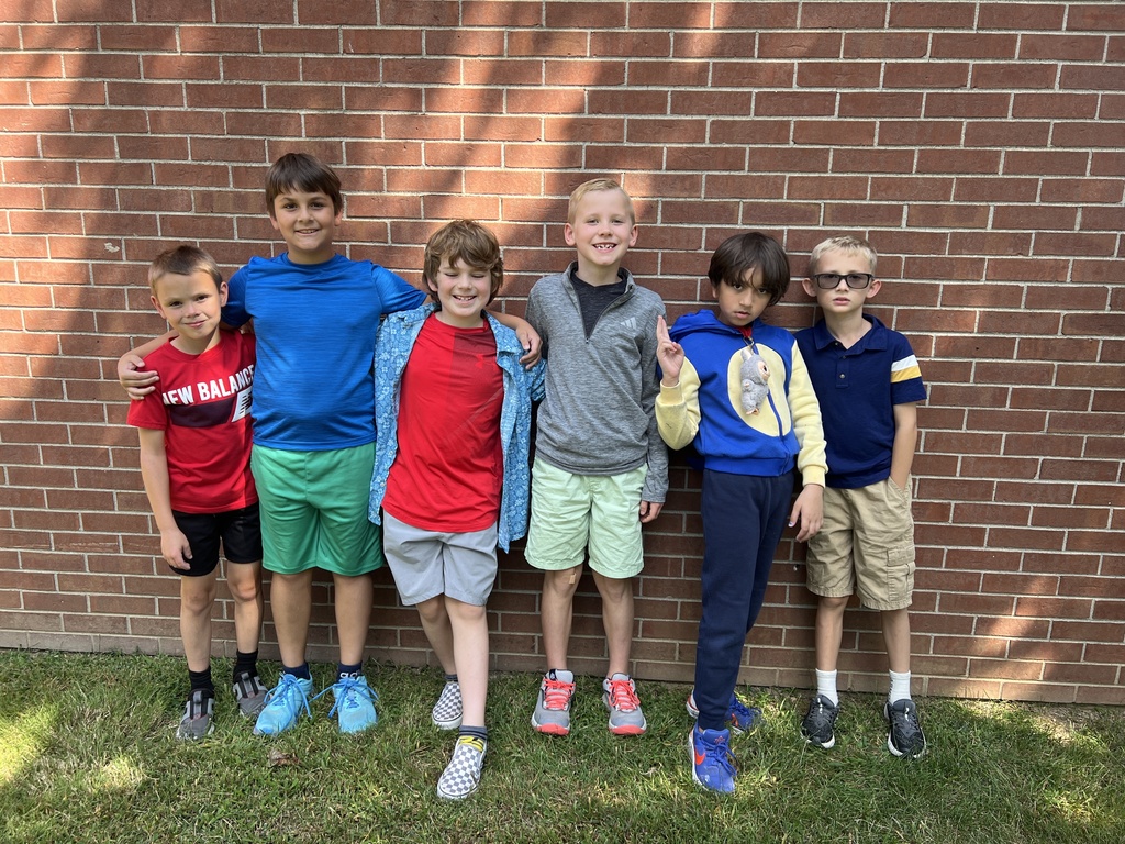 Students smiling together outside