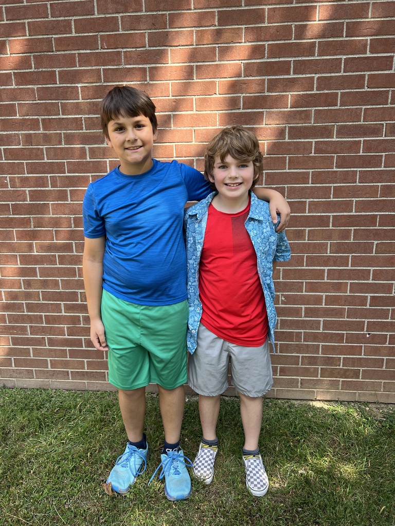 Students smiling together outside