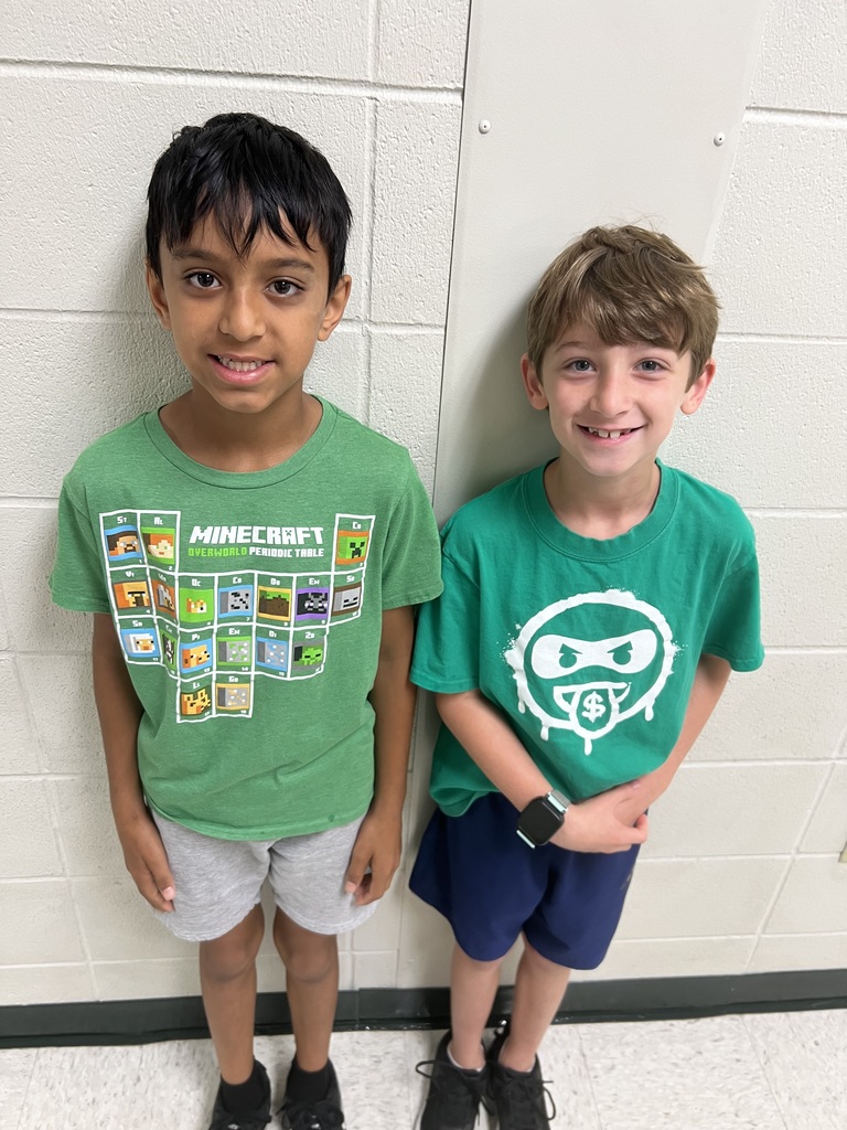 Students celebrating homecoming week with GREEN Homecoming Spirit!